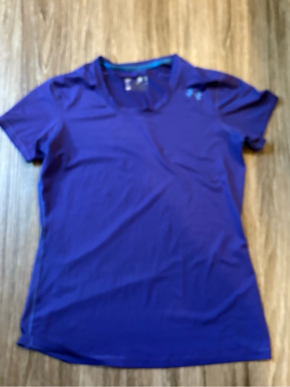 UA
Women's or Men Purple Performance Short-Sleeve Top